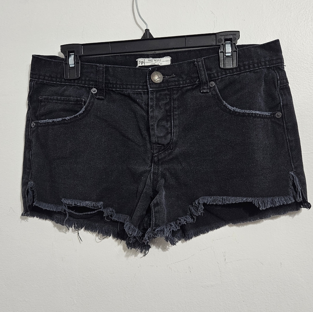 Free People Black Sharkbite denim shorts. Size W 28